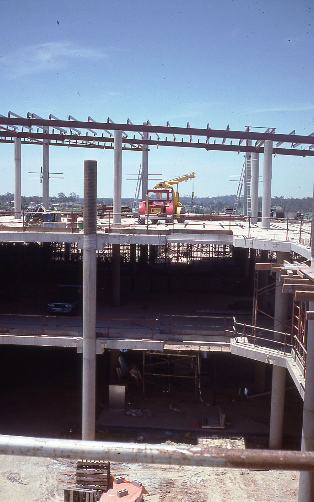 Crane working on construction of upper floor of Redbank Plaza, Redbank, Ipswich, c.1985