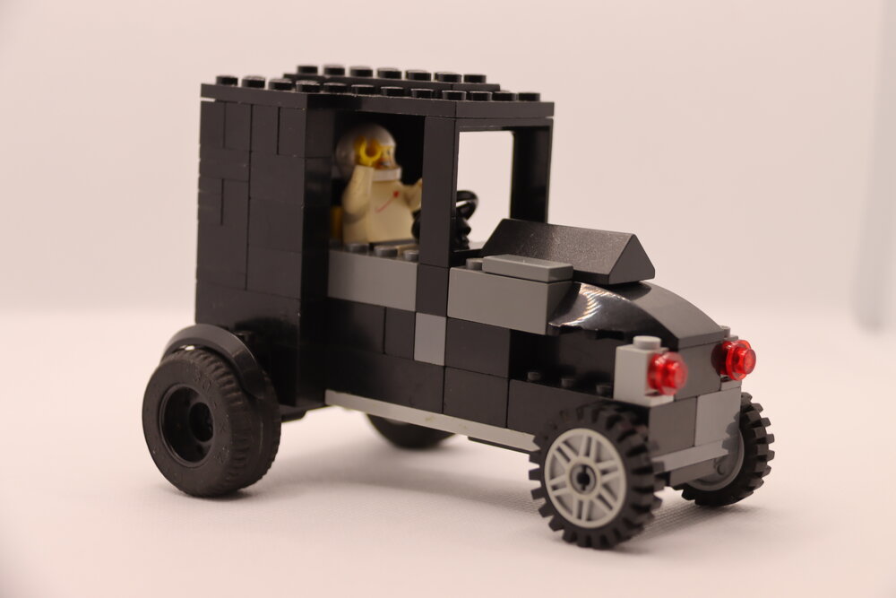 Brickswich version of Unidentified man with vintage Ford Model T, Ipswich, November 1977