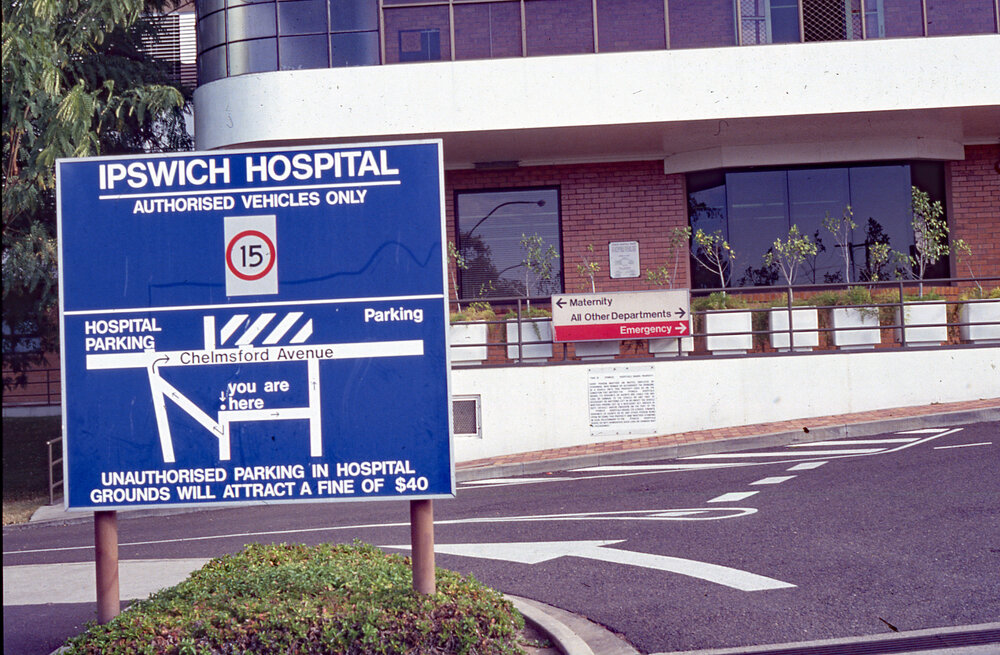 Hospital Parking Direction Sign. 