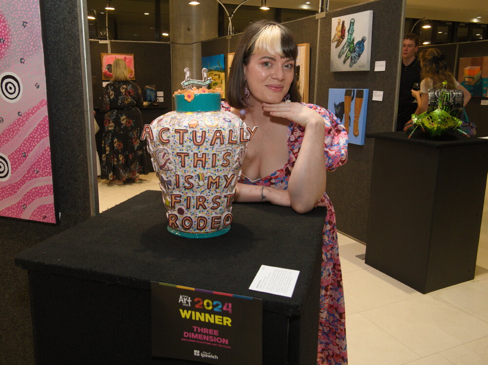 Artist Bonnie Hislop with her ceramic sculpture "Actually This Is My First Rodeo", Ipswich Art Awards, 2024