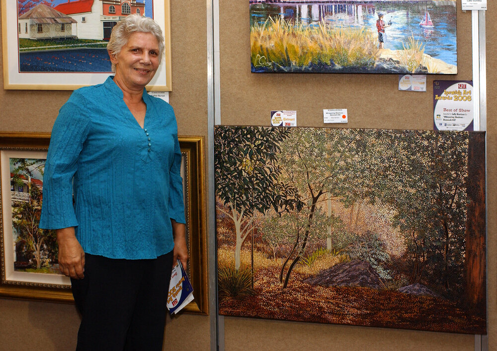 Sally Harris with her painting, winner of the Best of Show, Ipswich Art Awards, 2006