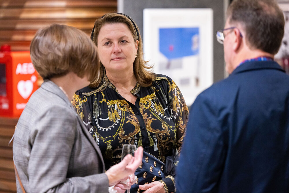 Mayor Teresa Harding speaking with attendees at the Ipswich Art Awards, 2023