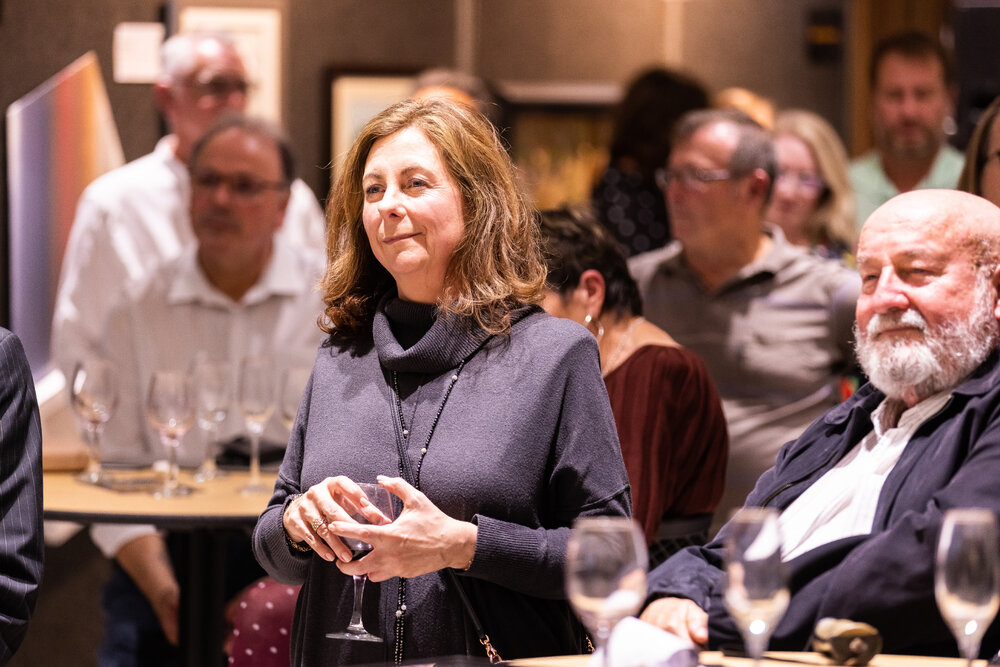 Jennifer Howard (MLA) and Wayne McDonnell listening to speeches at the Ipswich Art Awards, 2022