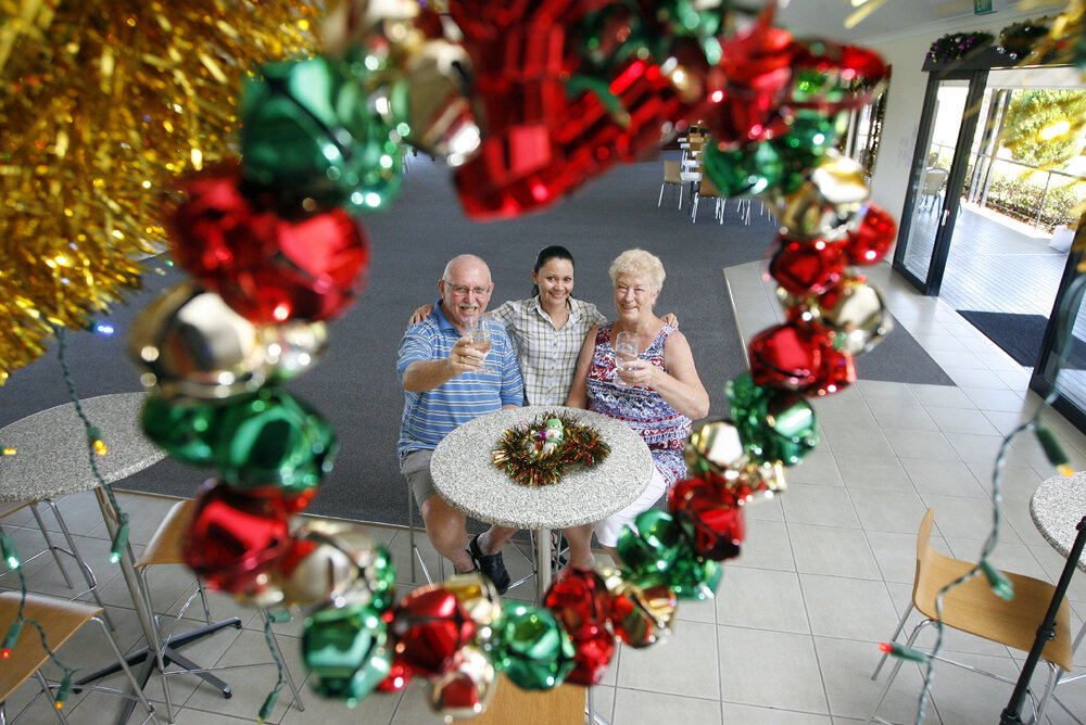 Frank Rayner and Annette Beevers from the Bremer Waters Social Club with Brassall Shopping Centre marketing manager Selena Beevers, Brassall, Ipswich, December 2011