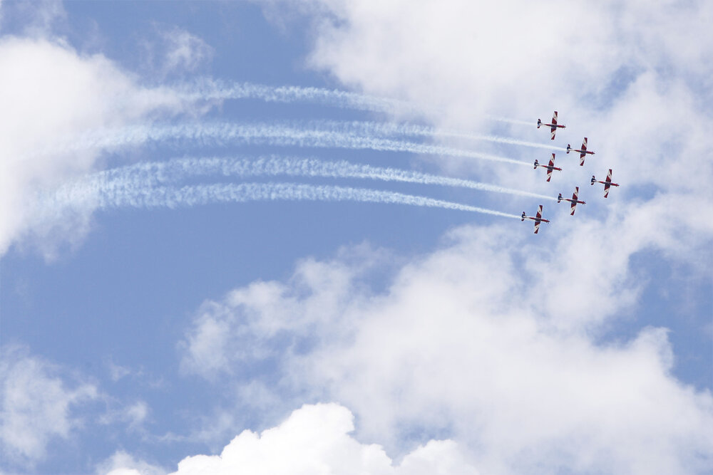 RAAF Roulettes performing aerobatic displays for Ipswich State High School students, Brassall, Ipswich, October 2011