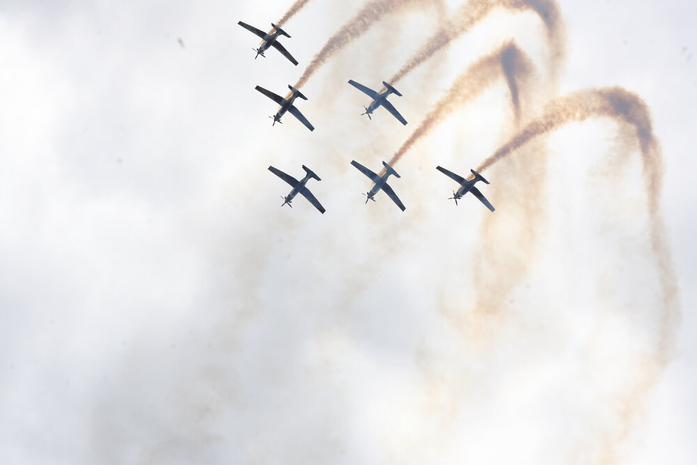 RAAF Roulettes performing aerobatic displays for Ipswich State High School students, Brassall, Ipswich, October 2011