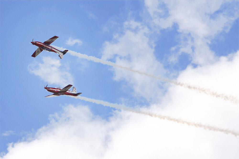 RAAF Roulettes performing aerobatic displays for Ipswich State High School students, Brassall, Ipswich, October 2011