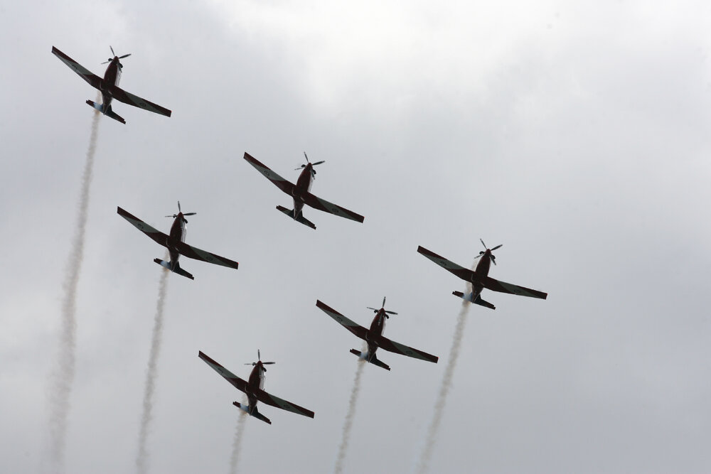 RAAF Roulettes performing aerobatic displays for Ipswich State High School students, Brassall, Ipswich, October 2011