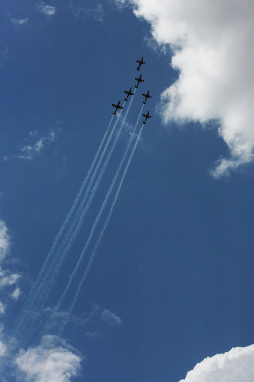 RAAF Roulettes performing aerobatic displays for Ipswich State High School students, Brassall, Ipswich, October 2011