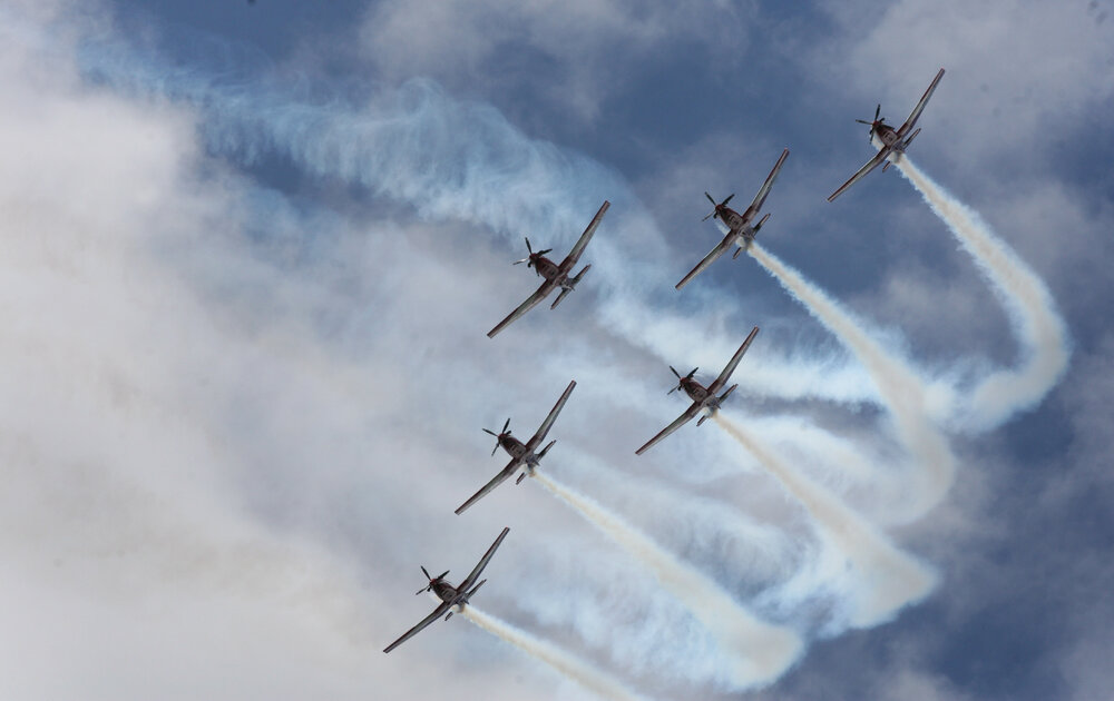 RAAF Roulettes performing aerobatic displays for Ipswich State High School students, Brassall, Ipswich, October 2011