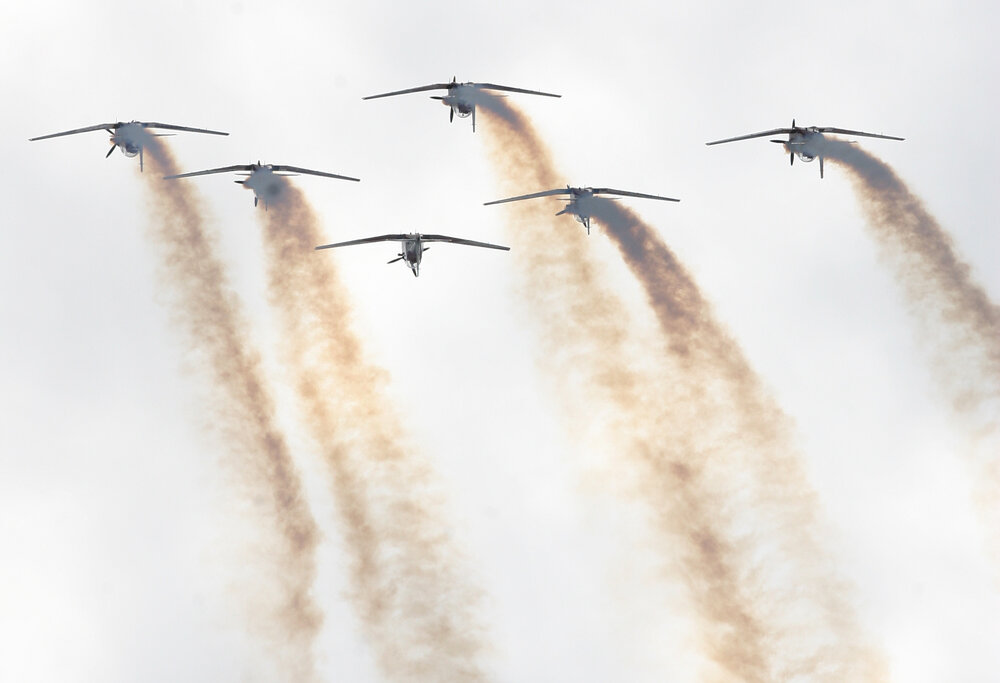 RAAF Roulettes performing aerobatic displays for Ipswich State High School students, Brassall, Ipswich, October 2011