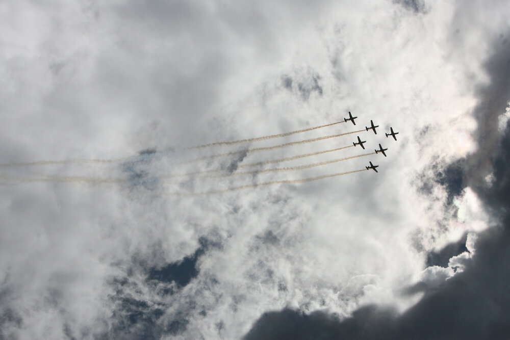 RAAF Roulettes performing aerobatic displays for Ipswich State High School students, Brassall, Ipswich, October 2011