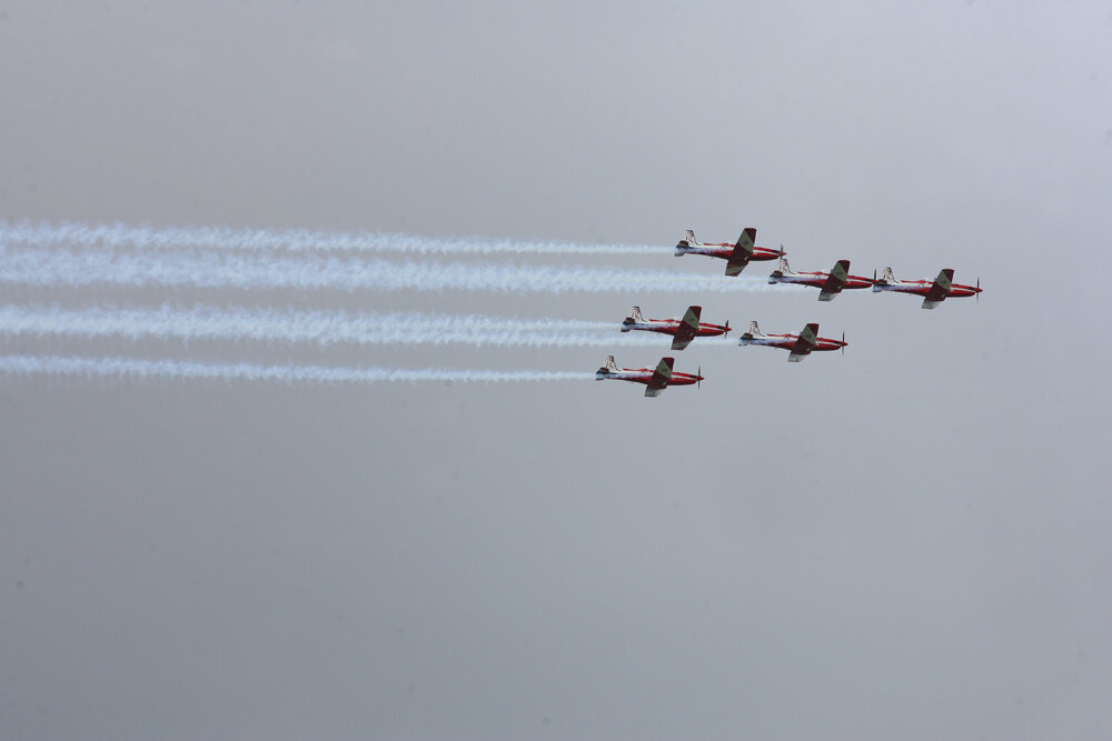 RAAF Roulettes performing aerobatic displays for Ipswich State High School students, Brassall, Ipswich, October 2011