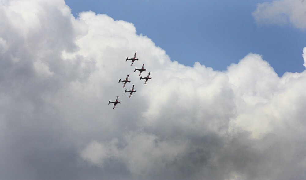 RAAF Roulettes performing aerobatic displays for Ipswich State High School students, Brassall, Ipswich, October 2011