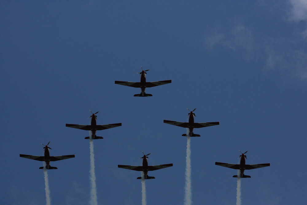RAAF Roulettes performing aerobatic displays for Ipswich State High School students, Brassall, Ipswich, October 2011