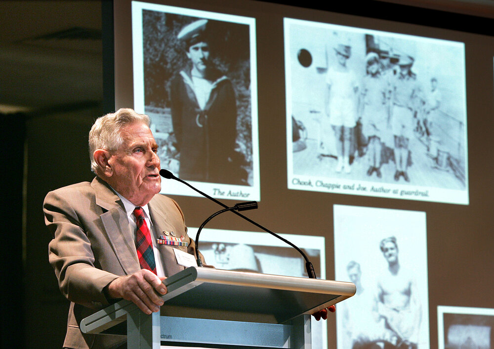 Alan Grimmer, former HMAS Ipswich sailor and author of 'A History of HMAS Ipswich', at the Ipswich Art Gallery