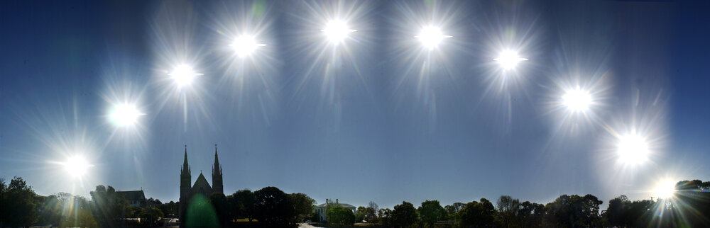 Winter Solstice 2004 - A panorama of the solar path through the Ipswich sky from 7am until 4 pm over St. Mary's Catholic Church, Ipswich, June 2004