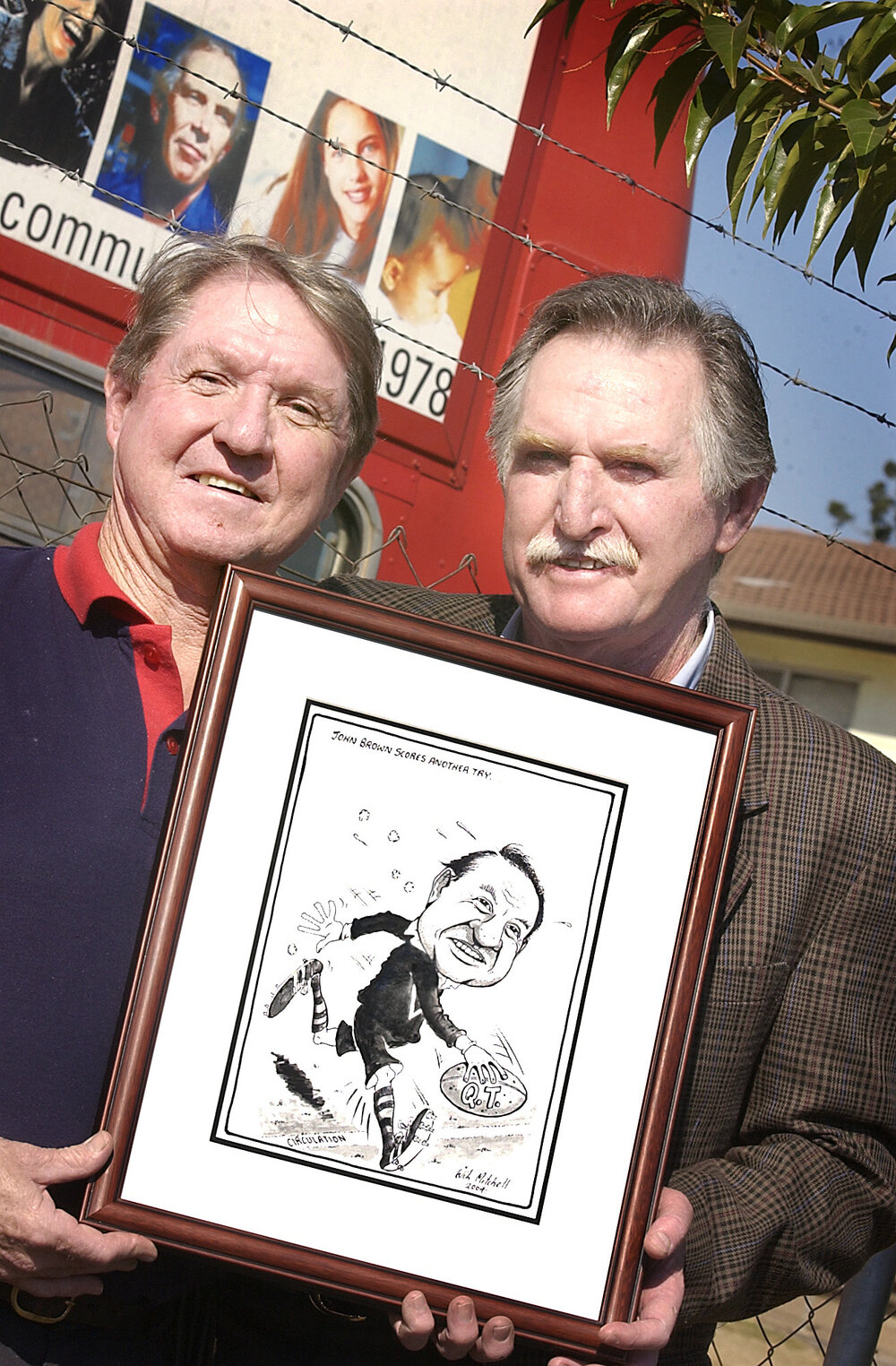 Sport Champion John Brown with Cartoonist Will Mitchell, Ipswich, June 2004