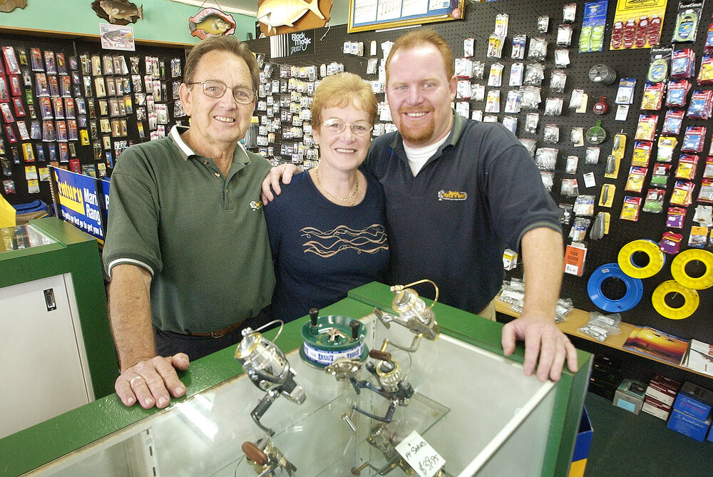 Bunny and Laraine Qualischefski and their son, retiring after 70 years in Downes bait and tackle, Ipswich, July 2004 