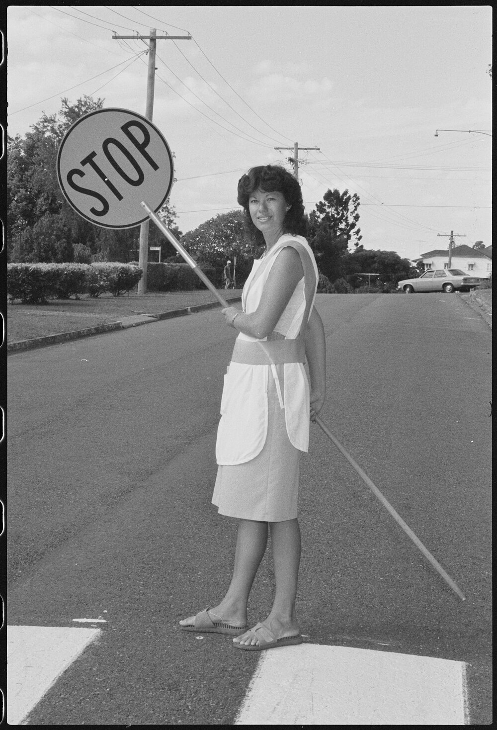 Unidentified lollipop lady, first day of school, Ipswich, January 1986
