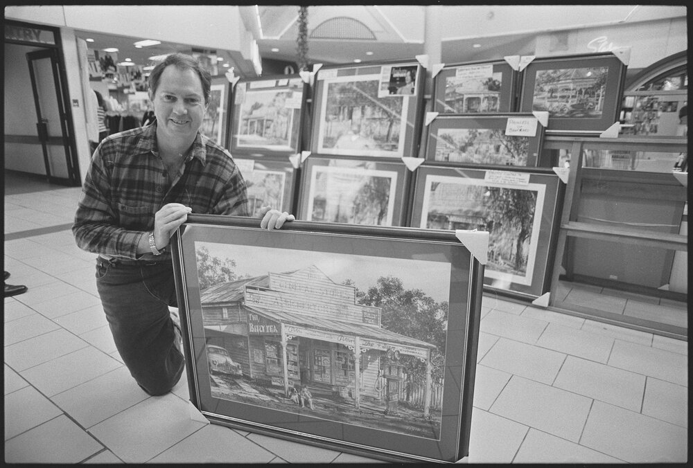 Unidentified man displaying art work at Booval Fair, Ipswich, 1st August 1994