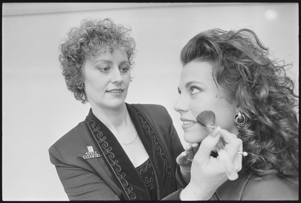 Grace Cosmetics make-up artist with unidentified client, location unknown, 1st August 1994