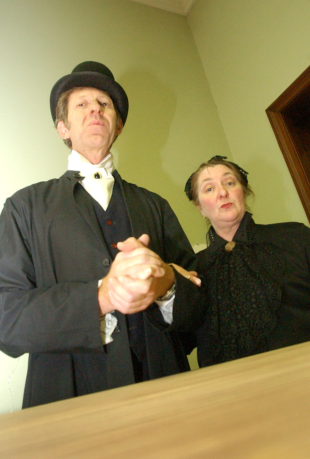 Paul Fyfe as "Mr Sowerberry" (the undertaker) and Susan Glosko as "Mrs Sowerberry" as part of the cast in the Oliver Musical, Ipswich, August 2004 