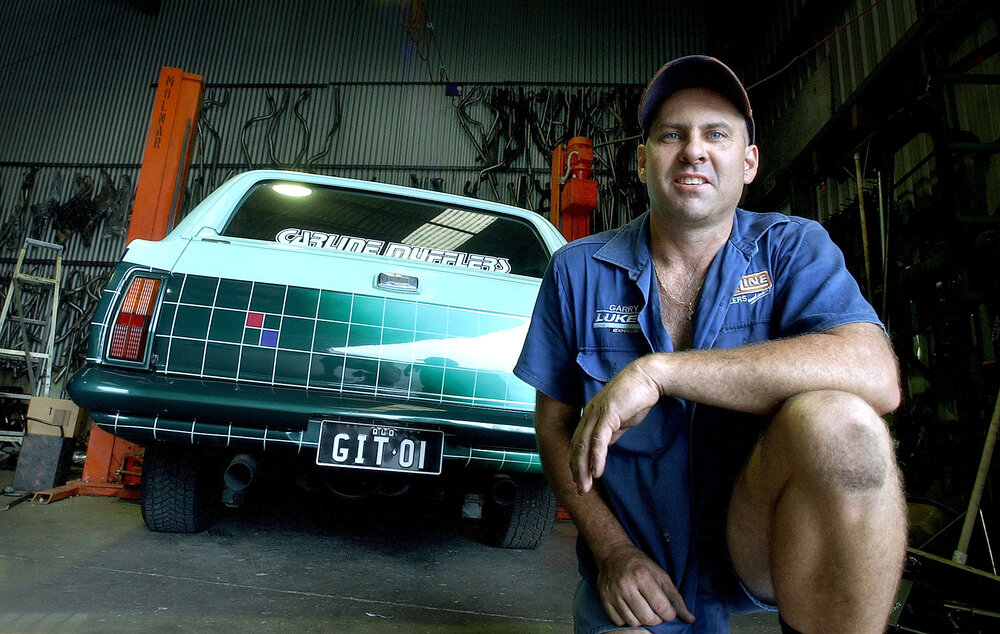 Carline Mufflers owner Garry Pryde and assistant Terry Mills, Ipswich, January 2005 