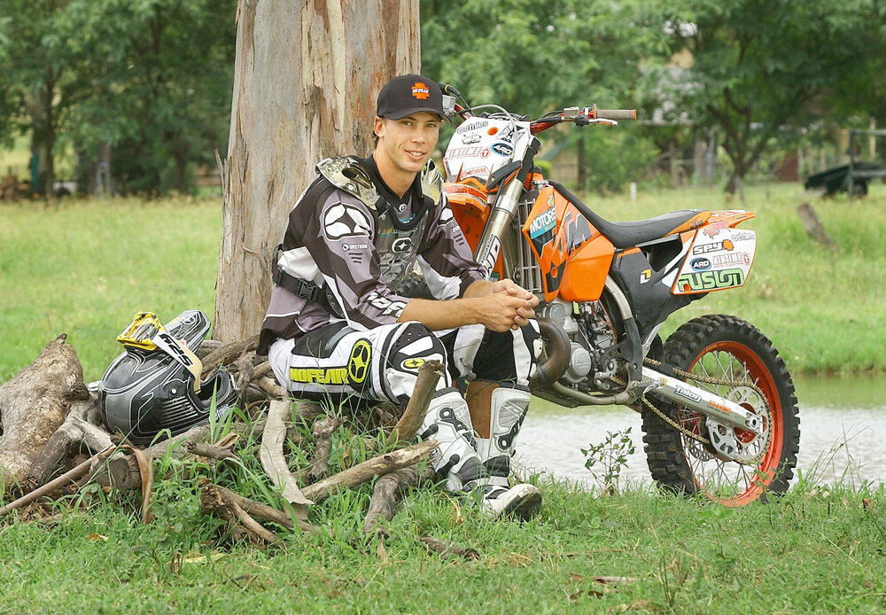 Freestyle rider Matt Schubring does a few jumps on his practice ramps at Boonah in preparation for upcoming tour with The Crusty Demons, Ipswich, January 2005 