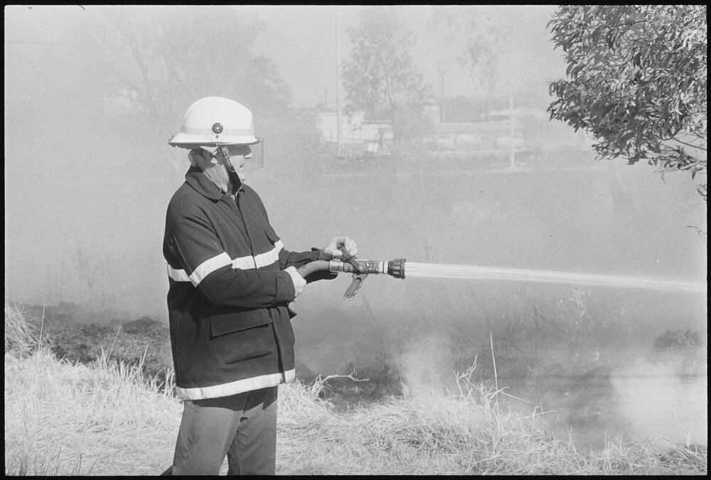 Firefighter at a grass fire, location unknown, 3rd August 1994