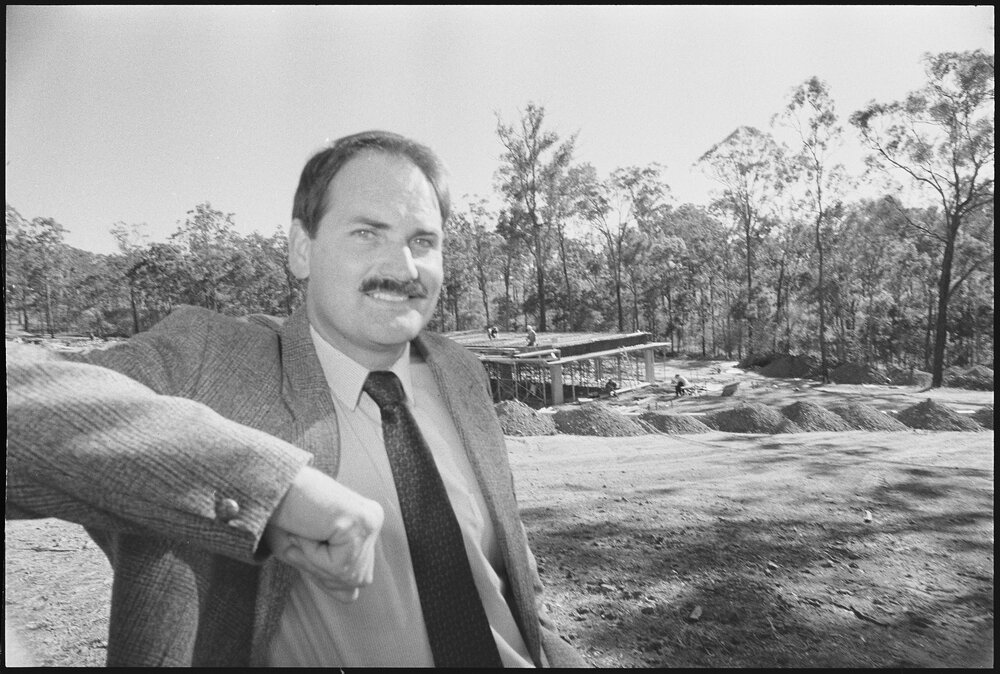 Unidentified business man at a construction site, location unknown, 3rd August 1994
