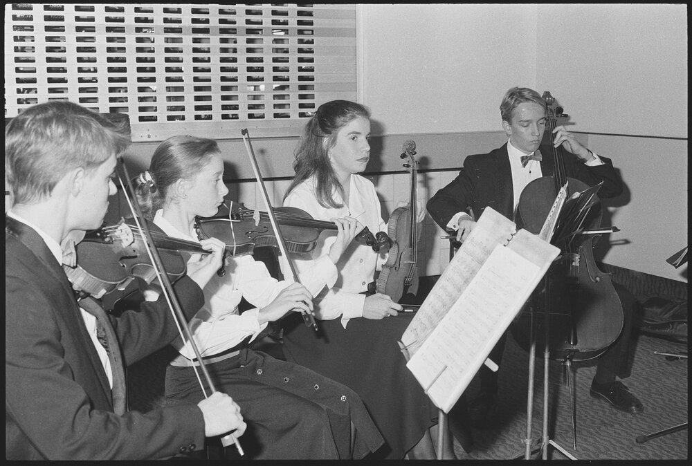 Unidentified string quartet performing in the foyer of the Ipswich Civic Centre, Ipswich, 3rd August 1994