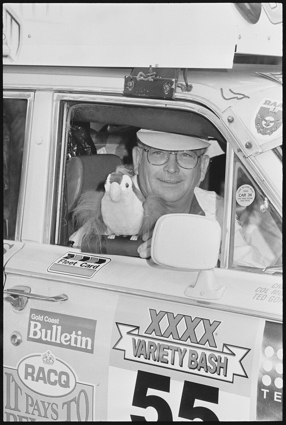 Unidentified man driving one of the vehicle entrants in the Variety Bash, Brisbane Street, Ipswich, 5th August 1994