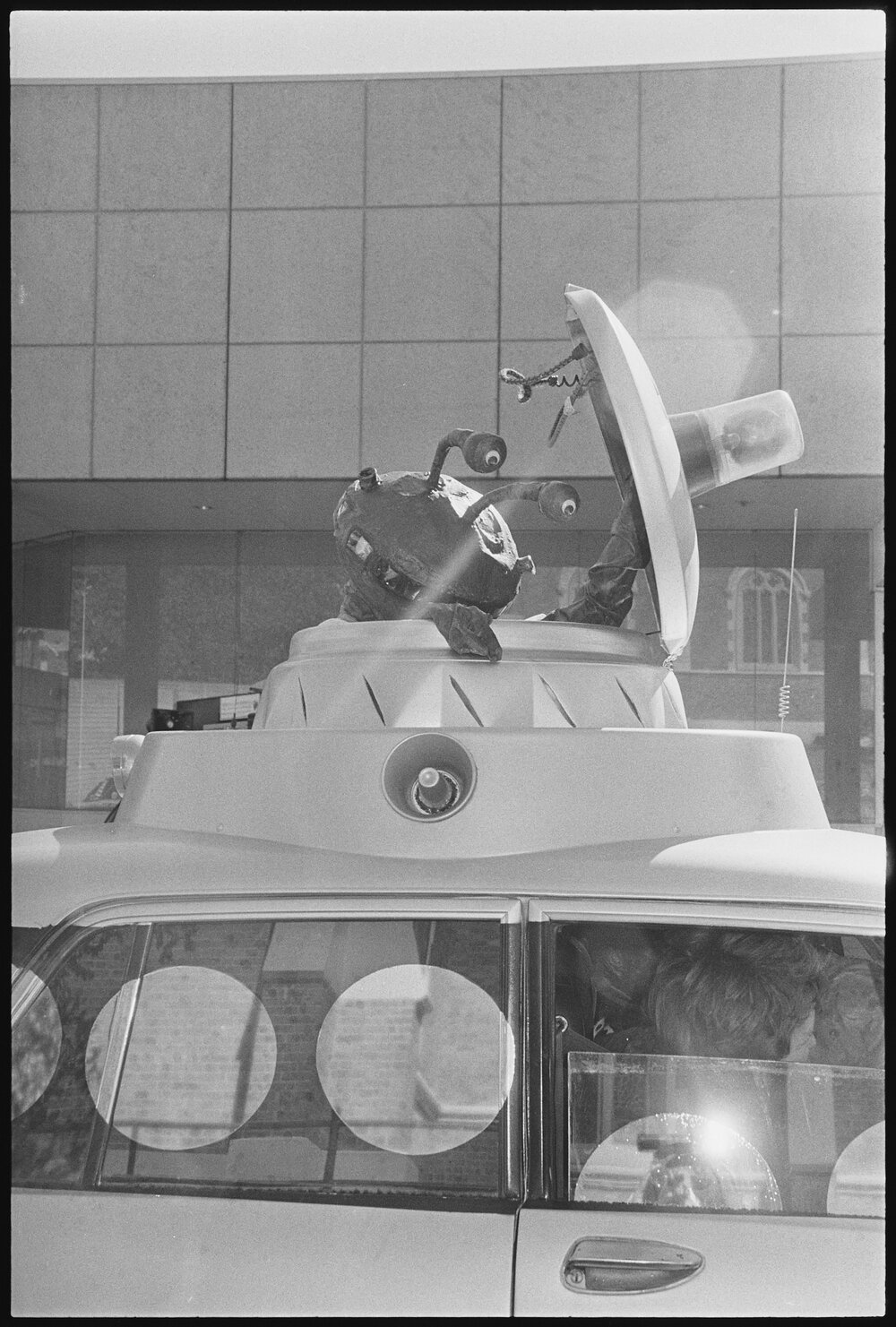 An alien, atop a vehicle that was taking part in the Variety Bash, Brisbane Street, Ipswich, 5th August 1994