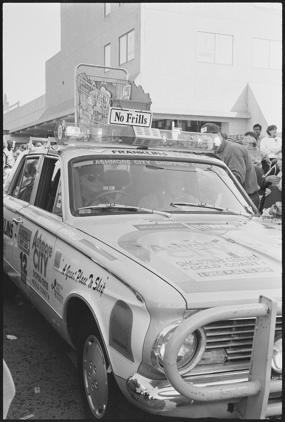 Entrant in the Variety Bash drives down Brisbane Street, Ipswich, 5th August 1994