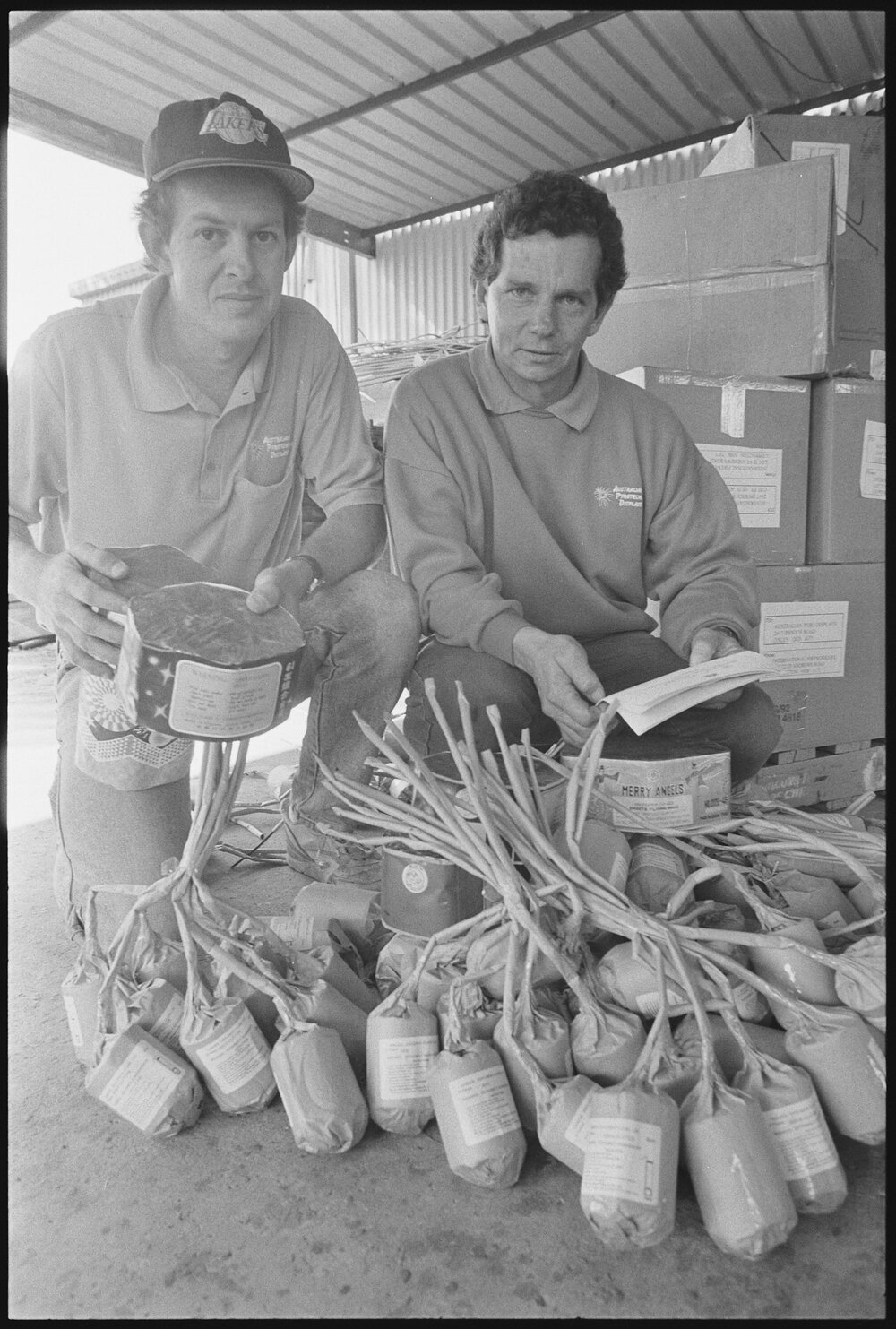 Two unidentified men from Australian Pyrotechnic Displays with fireworks, location unknown, 5th August 1994
