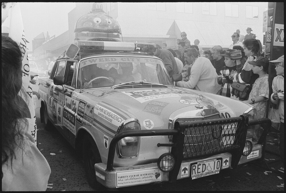 Entrant in the Variety Bash drives down Brisbane Street, Ipswich, 5th August 1994