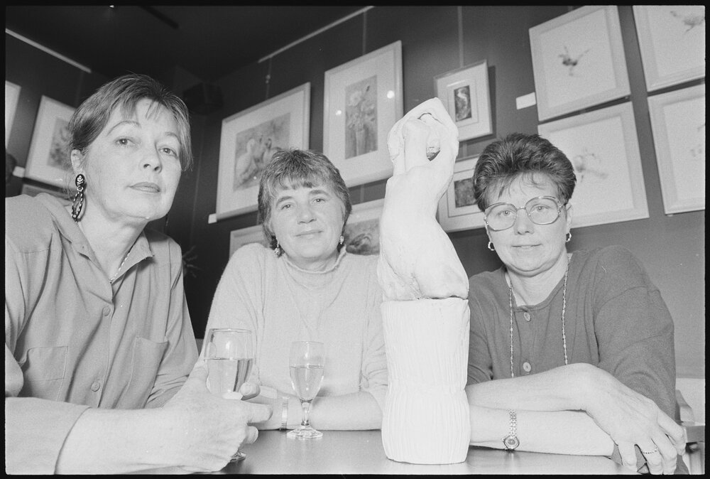 Three unidentified women at an art show at Centrepoint Boulevarde, Ipswich, Queensland, 9th August 1994