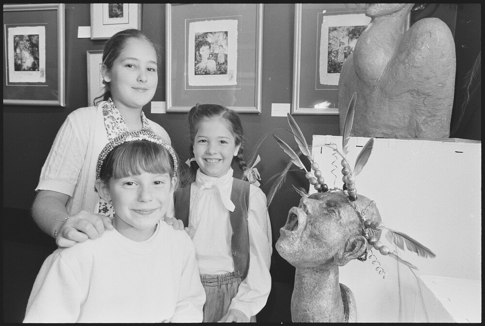 Three unidentified girls in an art exhibition at Centrepoint Boulevarde, Ipswich, Queensland, 9th August 1994