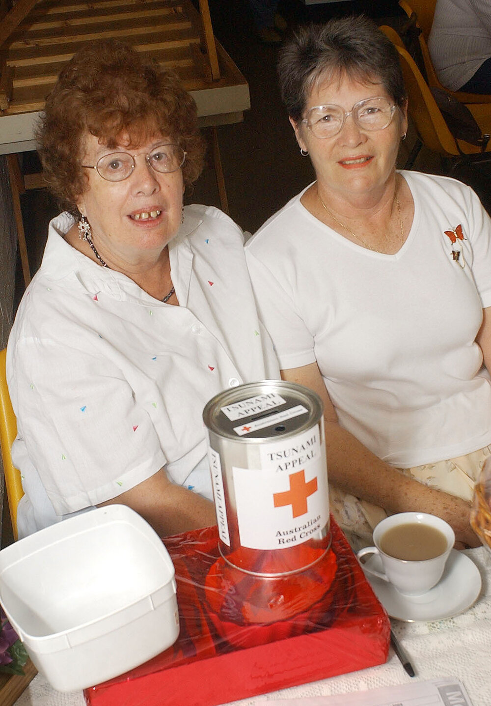Ipswich Red Cross members Pat Robinson and Pat Vogler at their morning tea in aid of the Asian tsunami victims, Ipswich, 12th January 2005 