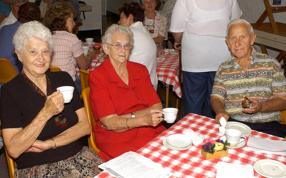 Ipswich Red Cross members Audrey Nutley, Nancy Ward and Ken Schneider at their morning tea in aid of the Asian tsunami victims, Ipswich, 12th January 2005