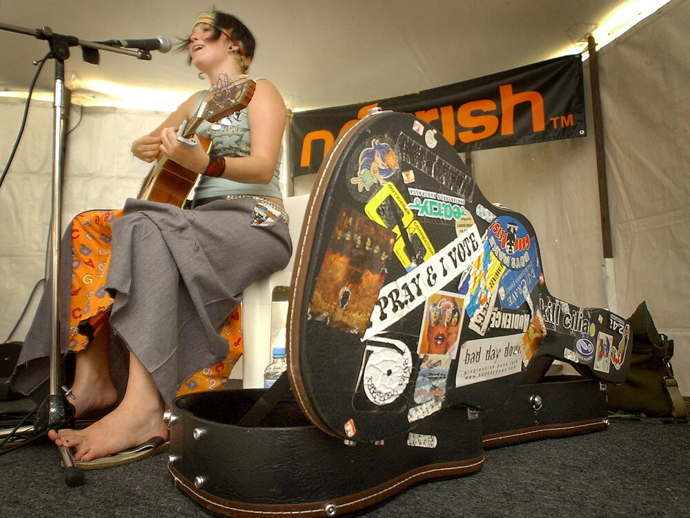 Christian folk rock singer Gabi Kubac lets her thoughts be know on her guitar case at Sonfest, Ipswich, 20th January 2005