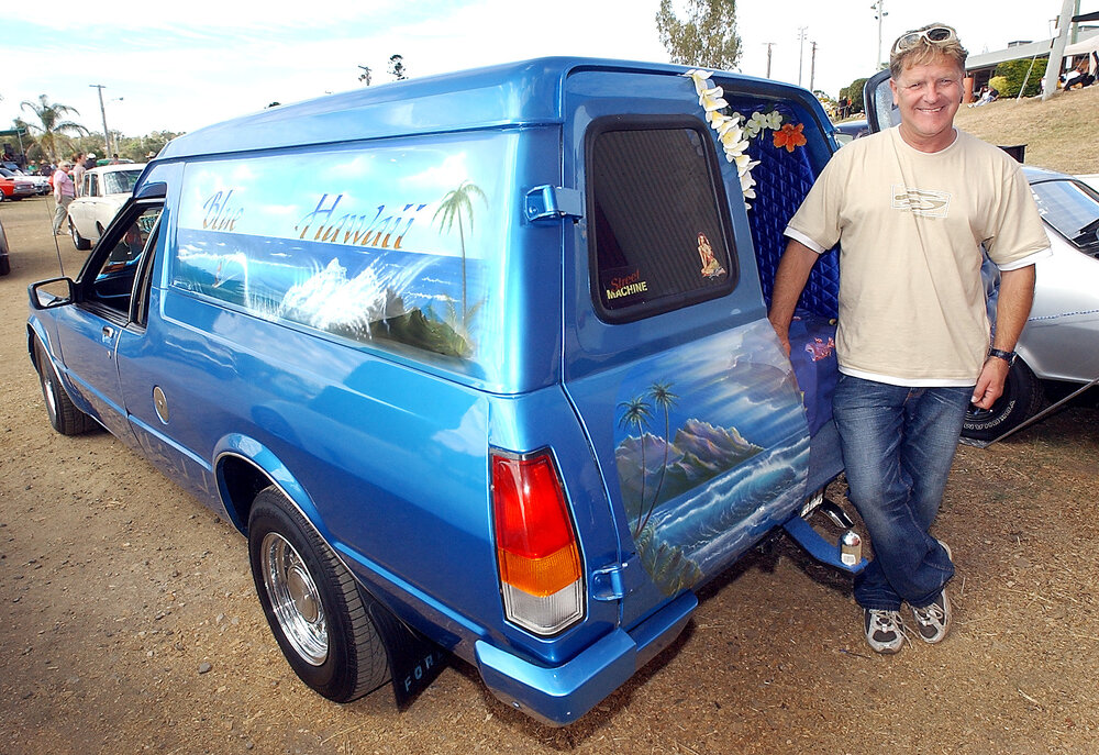 Wayne Dyer of Manly, with his 1990 Ford Panelvan 'Blue Hawaii' at the Just Rock Ipswich 'back to '63' rock 'n' roll spectacular car show, Ipswich, July 2004