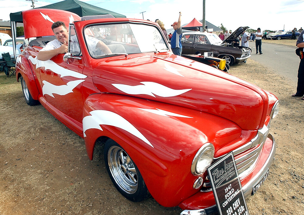 Jeff Crone of Peak Crossing, with his 'Grease Lightning' car, a 1947 Ford Convertible (with a 350 Chev and Turbo) at the Just Rock Ipswich 'back to '63' rock 'n' roll spectacular car show, Ipswich, July 2004 