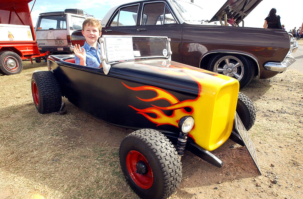Johnathan Crone of Peak Crossing, in his very own 1932  1/2 (half) Scale Ford Roadster at the Just Rock Ipswich 'back to '63' rock 'n' roll spectacular car show, Ipswich, July 2004