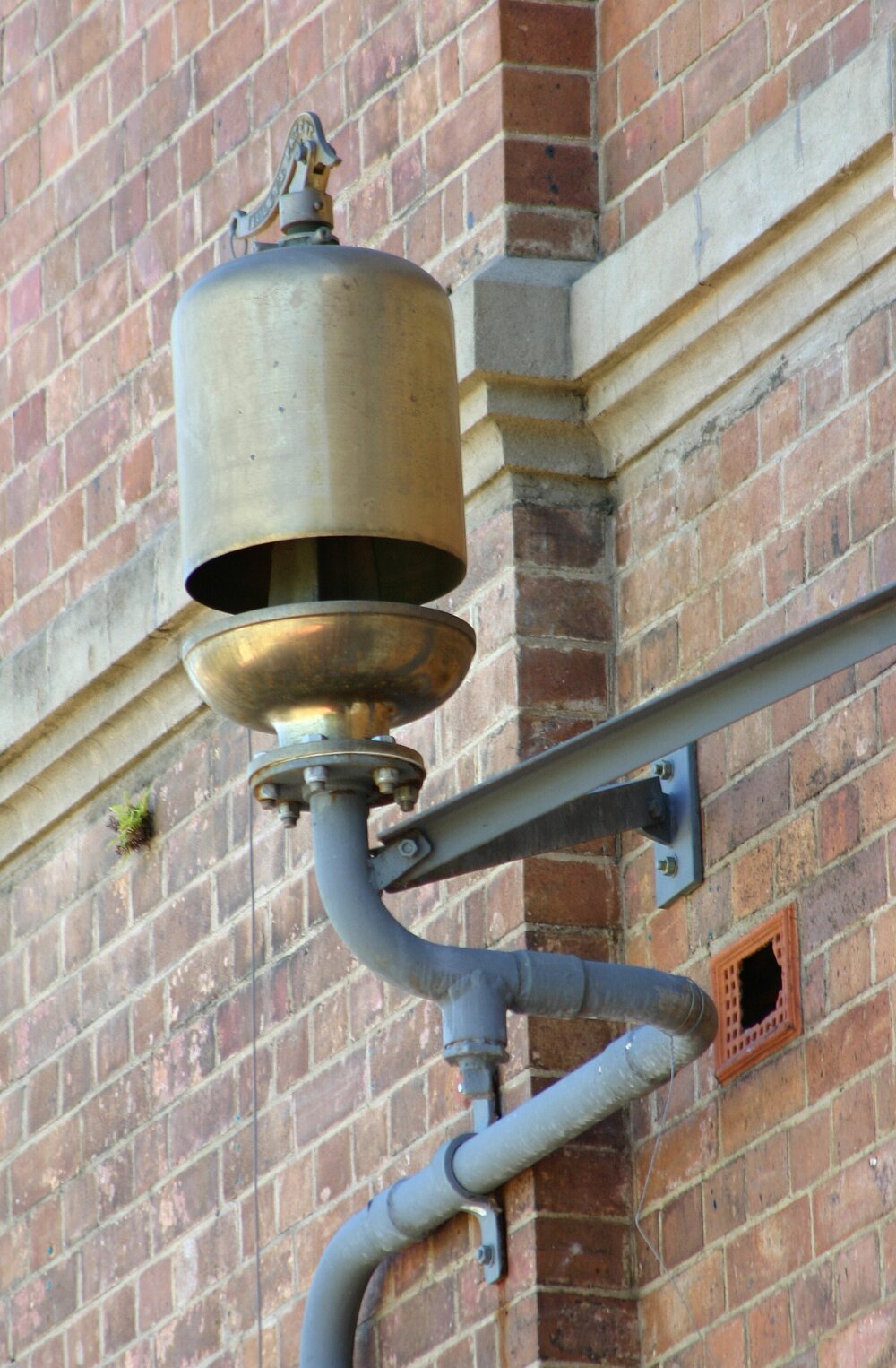 Whistle on side of a building at the Railway Workshops, North Ipswich, September 2004