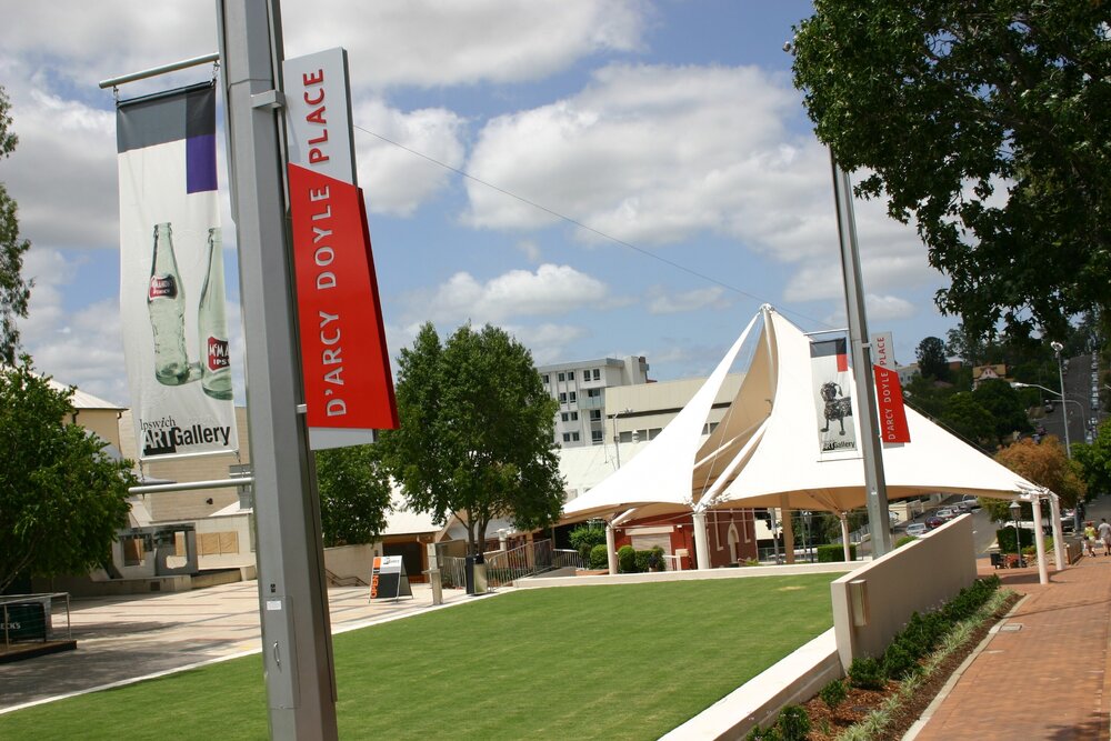 Ipswich Art Gallery signage, featuring McMahon's bottles, in d'Arcy Doyle Place, Ipswich, February 2006