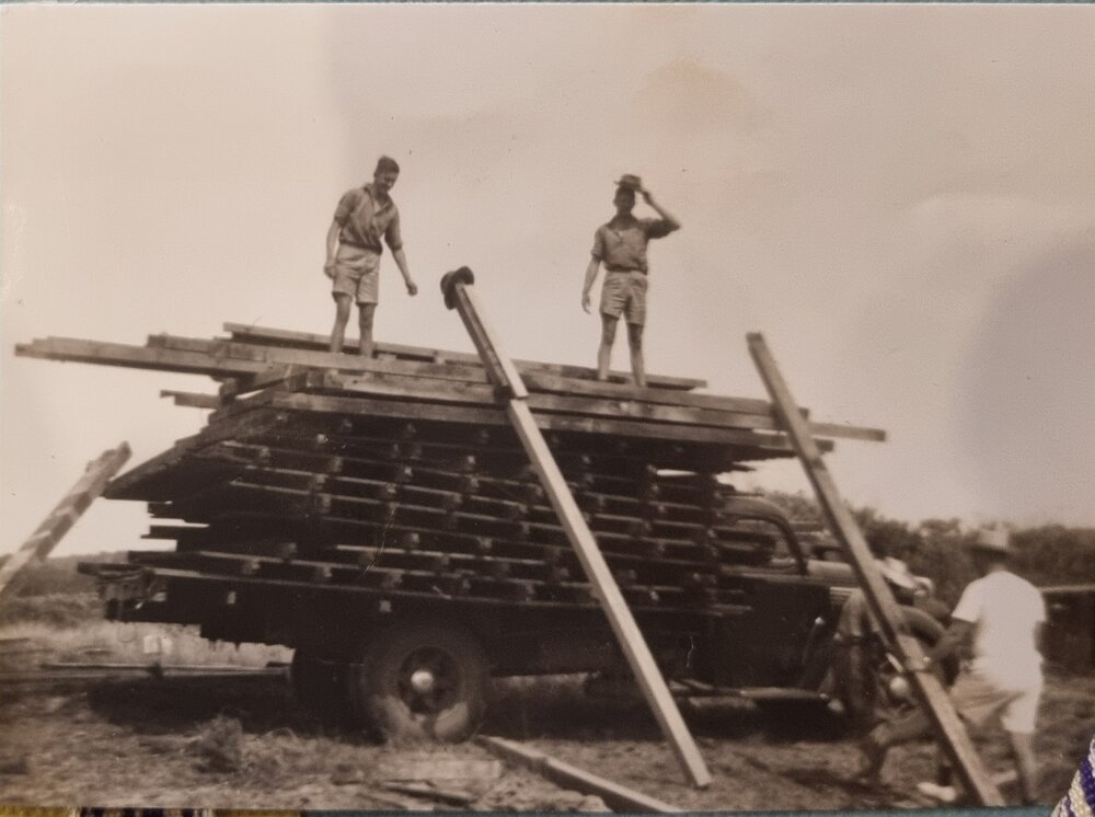 Don Risson's Ford helping to shift buildings to erect Camp Cal at Caloundra