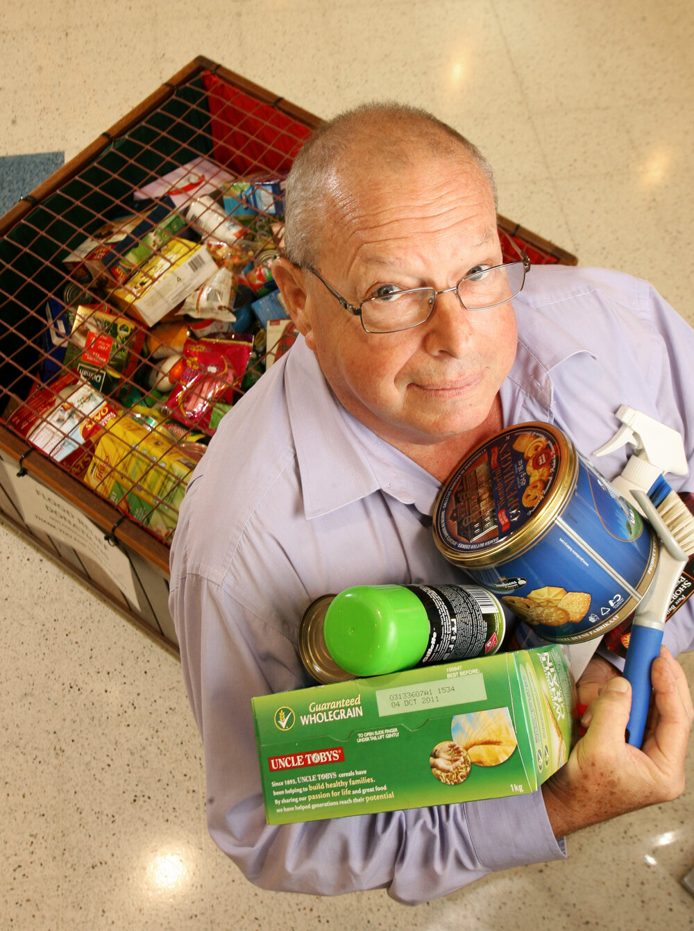 Brassall Shopping Centre manager, John Tofte has initiated a food appeal for those affected by floods in Queensland, Ipswich, 4th January 2011