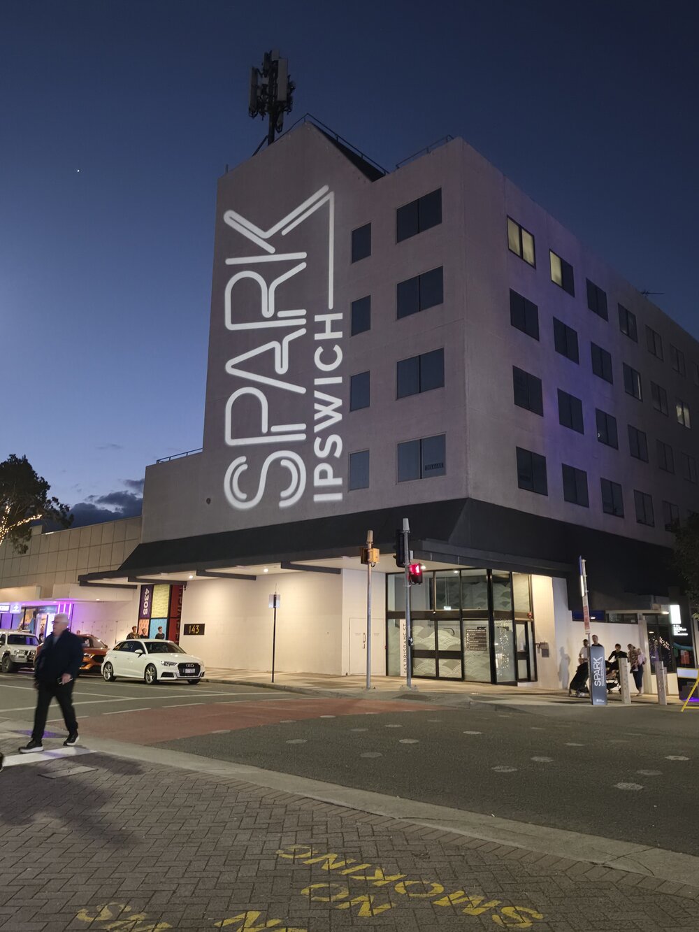 SPARK Ipswich, sign projected on to 143 Brisbane Street, Ipswich, July 2026